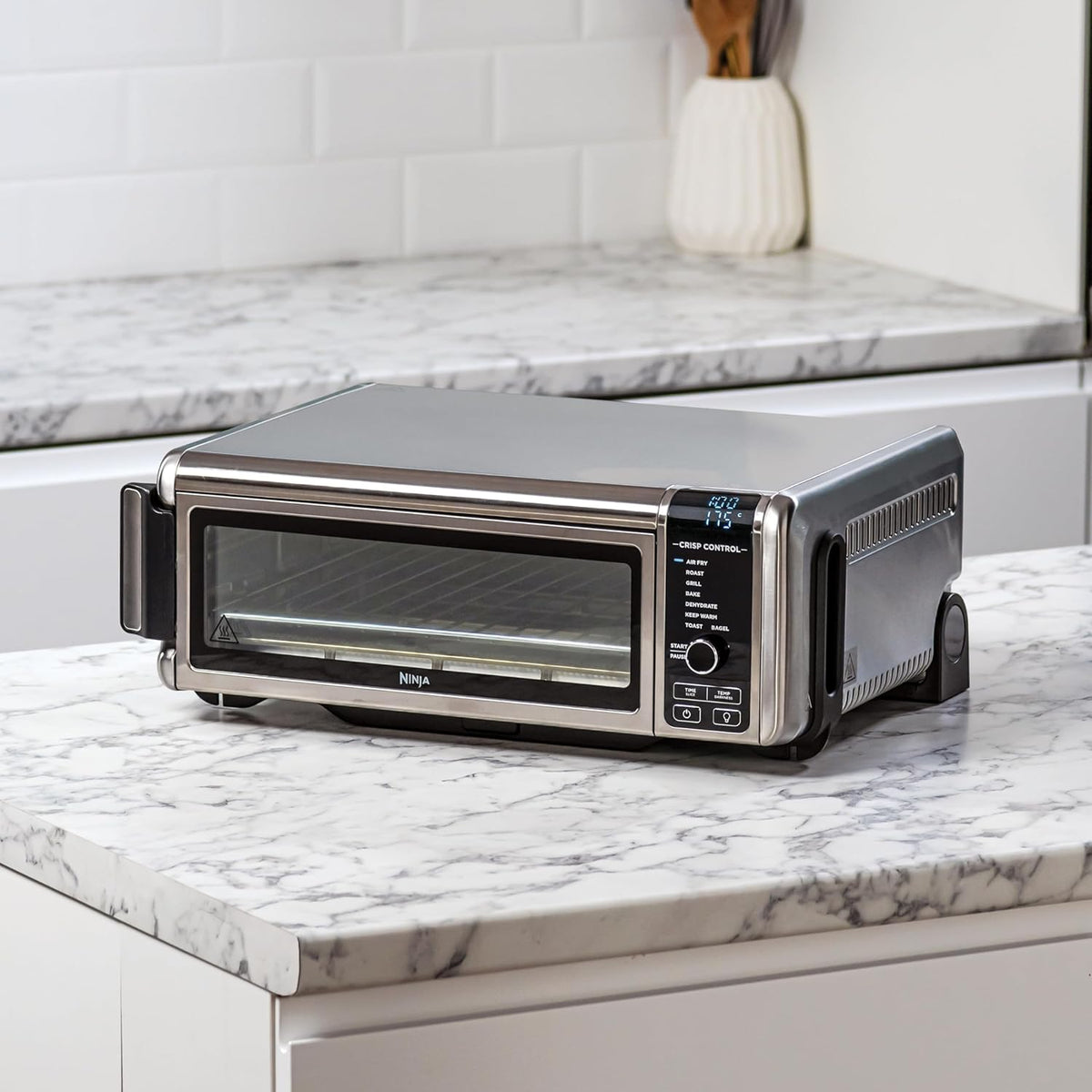 Ninja Foodi 8-in-1 Multifunction Oven, Portable Mini Oven, Work Surfaces, Multifunction Oven with 8 Cooking Functions; Air Fry, Roast, Grill, Bake and more. Silver/Black SP101EU