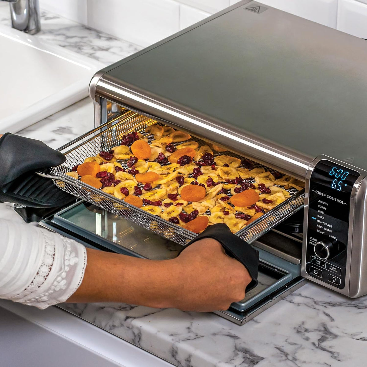 Ninja Foodi 8-in-1 Multifunction Oven, Portable Mini Oven, Work Surfaces, Multifunction Oven with 8 Cooking Functions; Air Fry, Roast, Grill, Bake and more. Silver/Black SP101EU